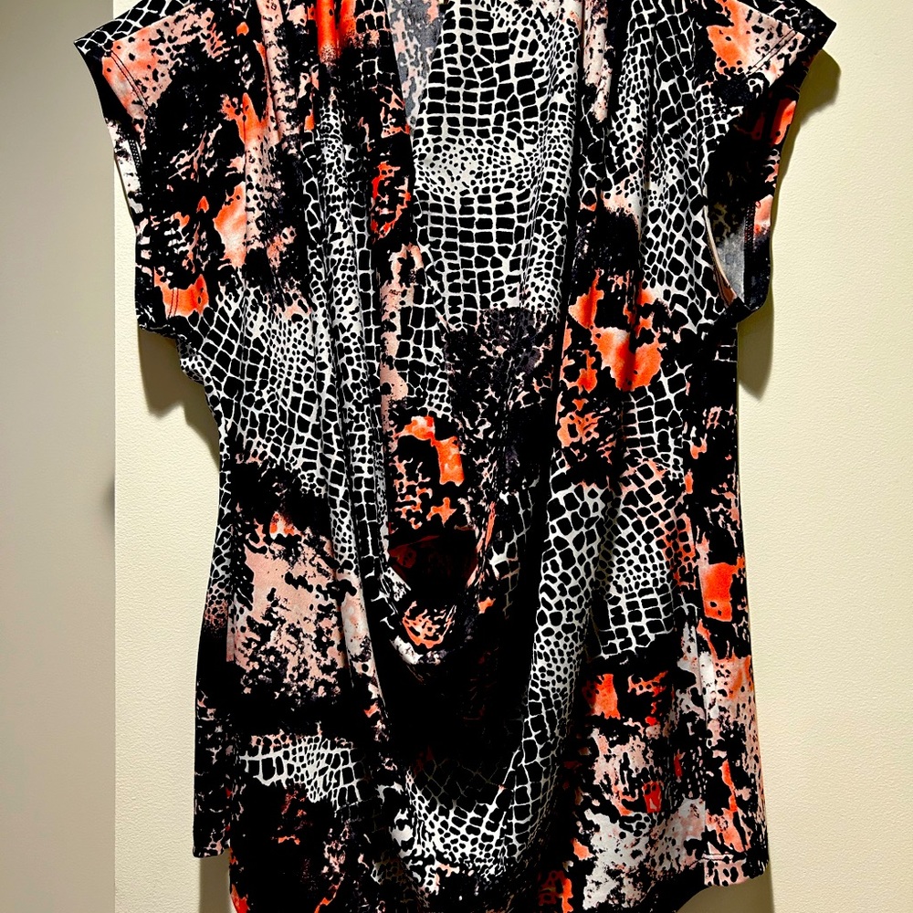 Lovely, silky black and orange short sleeve top